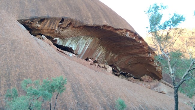 It looks like the mouth of an animal and will have been woven into a Dreamtime story.