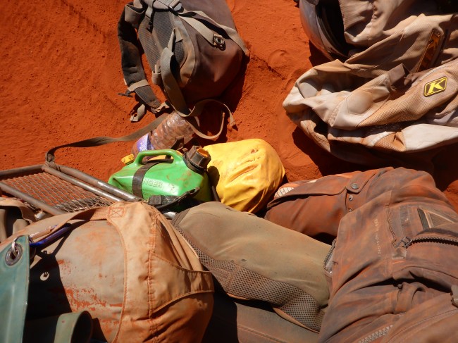 Bike, sand luggage, leg. They all seem to have got mixed up, somehow.