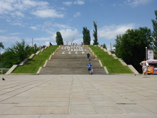 Steps leading up to the memorials. The slogan says 'For Our Soviet Motherland.'