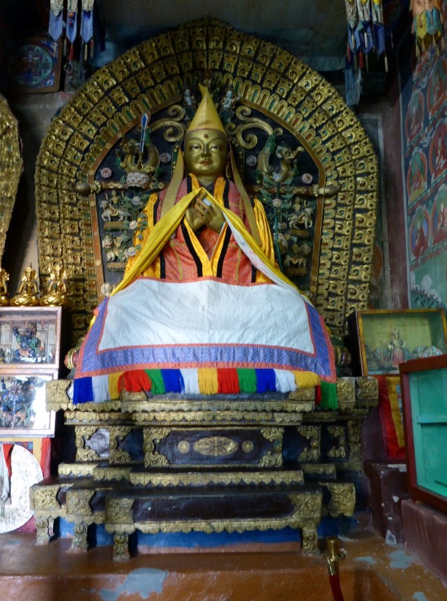 Large Buddhist statue but not sure who it is.
