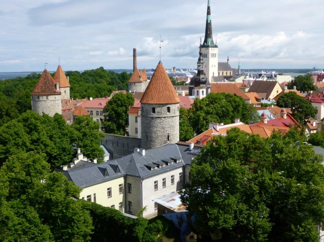 view over the rooftops to the harbour, with its cruise liners.