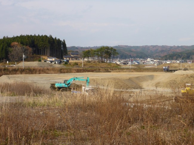 Huge areas of land have been cleared of buildings.