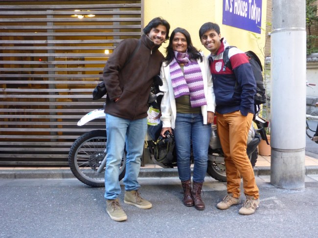Some helpful Indian visitors, hiding my bike from the parking attendants.