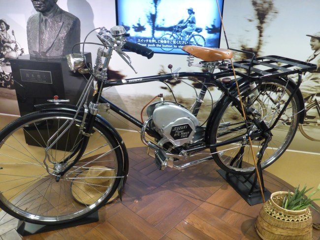 Bicycle with auxiliary engine.