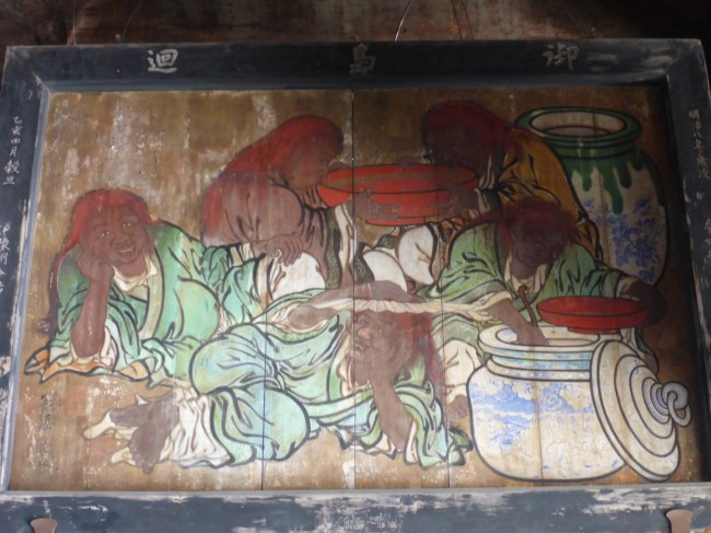 One of the paintings hanging inside the temple.