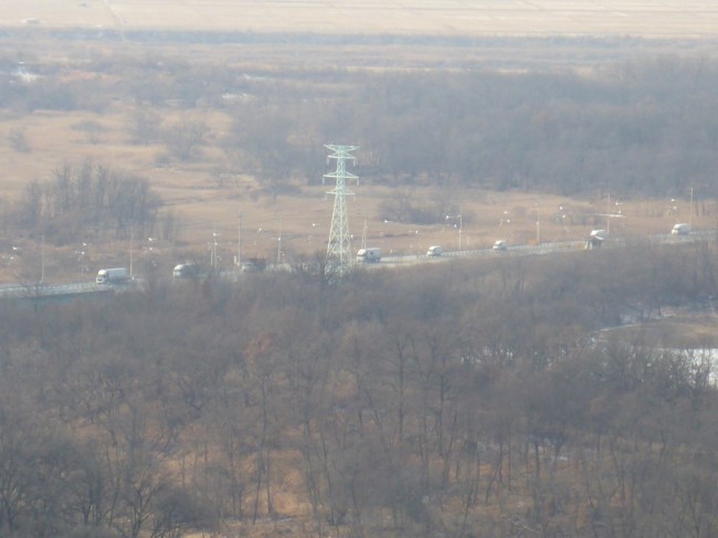 Trucks cross the Freedom Bridge.